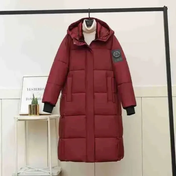 2024 neue Verdicken Schnee Parkas Mode Winddicht Glänzend Unten Baumwolle Mit Kapuze Frauen Jacke Winter Lose Lange Mantel Kleidung Damen