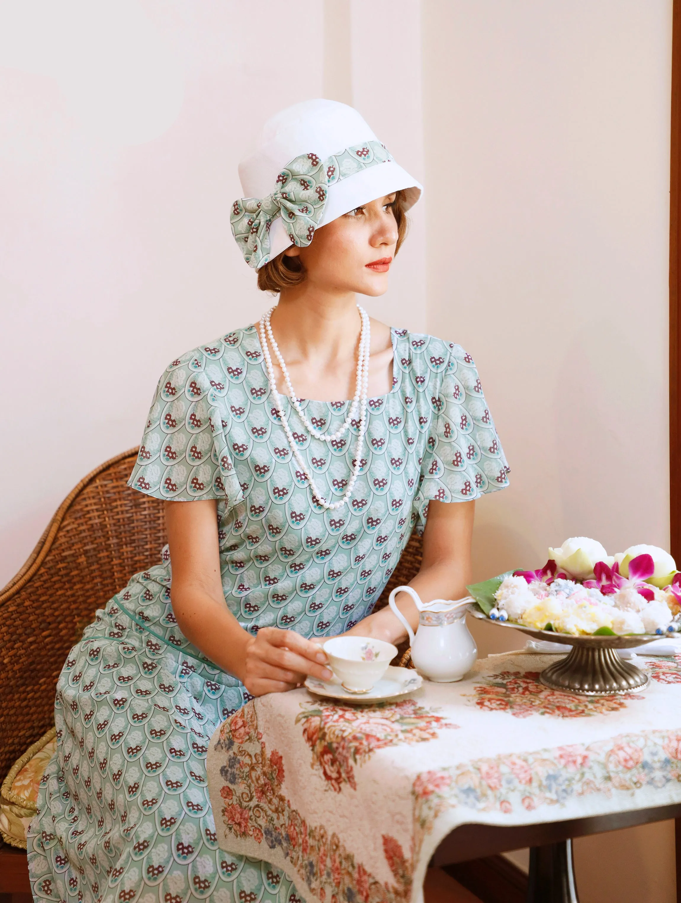 Printed green chiffon 1920s day dress with flutter sleeves